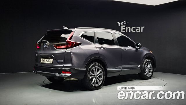 Honda CR-V 5-го поколения 2.0 Hybrid Touring 4WD - фото 0