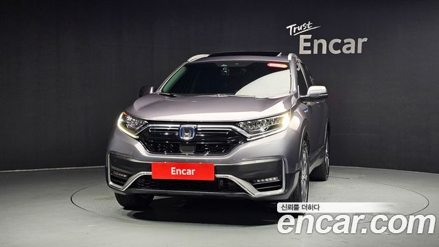 Honda CR-V 5-го поколения 2.0 Hybrid Touring 4WD - фото 1