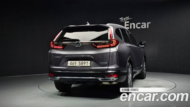 Honda CR-V 5-го поколения 2.0 Hybrid Touring 4WD - фото 2