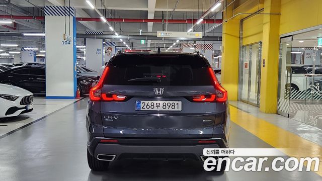 Honda CR-V 6-го поколения 2.0 Hybrid Touring 2WD - фото 2