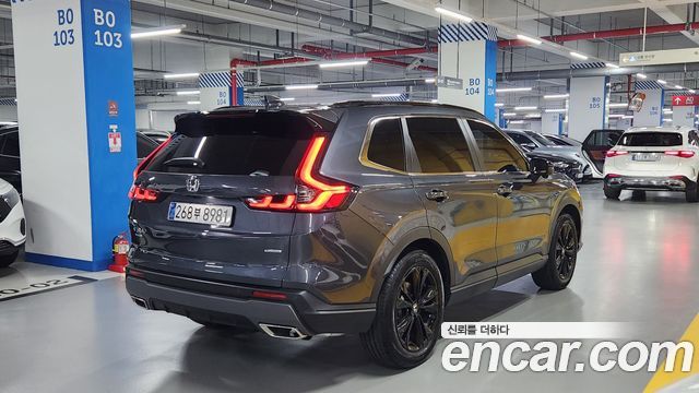 Honda CR-V 6-го поколения 2.0 Hybrid Touring 2WD - фото 3