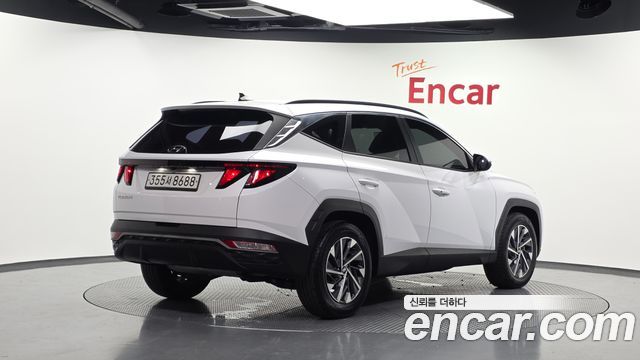 Hyundai Tucson NX4, гибрид Premium 2WD - фото 1
