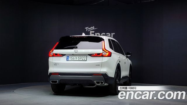Honda CR-V 6-го поколения 2.0 Hybrid Touring 2WD - фото 3