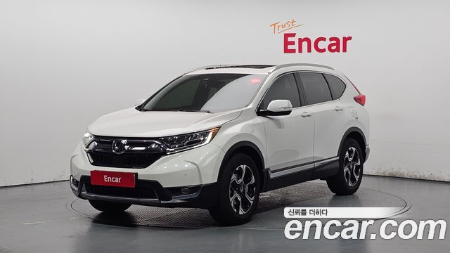 Honda CR-V 5-го поколения 1.5 Touring 4WD - фото 0