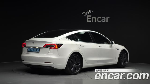 Tesla Model 3 Standard Range Plue RWD - фото 1