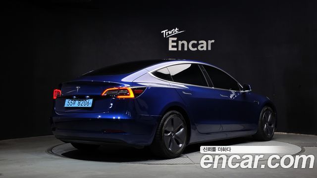 Tesla Model 3 Standard Range Plue RWD - фото 1