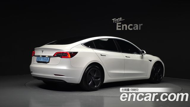 Tesla Model 3 Standard Range Plue RWD - фото 1