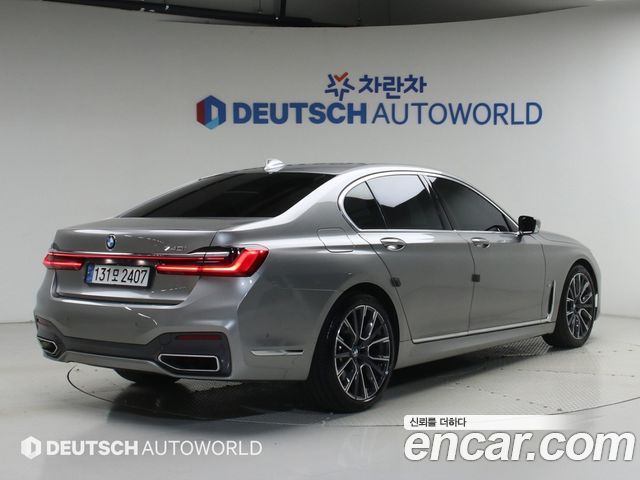 BMW 7 Series G11 740i M Sport - фото 1