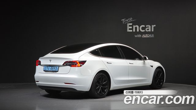Tesla Model 3 Standard Range Plue RWD - фото 1