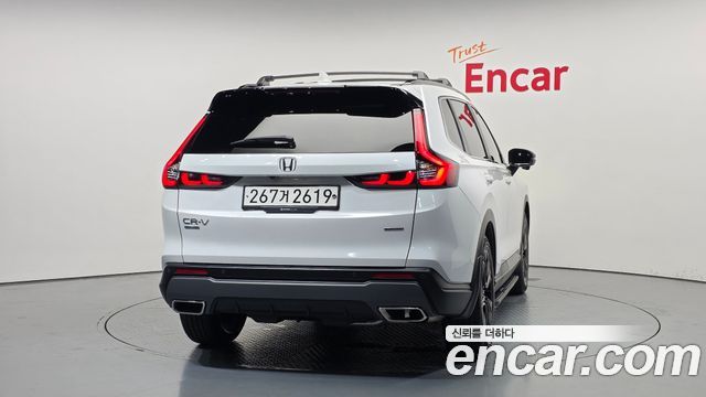 Honda CR-V 6-го поколения 2.0 Hybrid Touring 2WD - фото 3