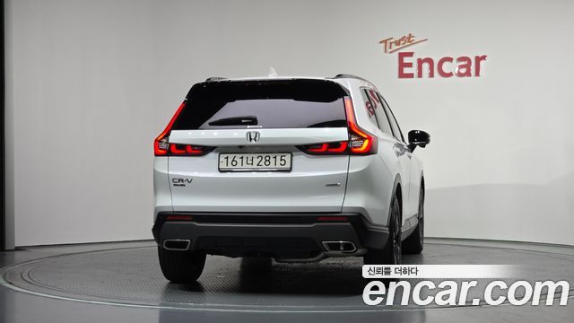 Honda CR-V 6-го поколения 2.0 Hybrid Touring 2WD - фото 3