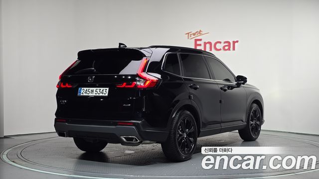 Honda CR-V 6-го поколения 2.0 Hybrid Touring 2WD - фото 1