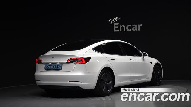 Tesla Model 3 Standard Range Plue RWD - фото 1