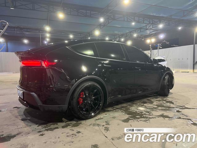 Tesla Model Y L Long Range AWD - фото 1