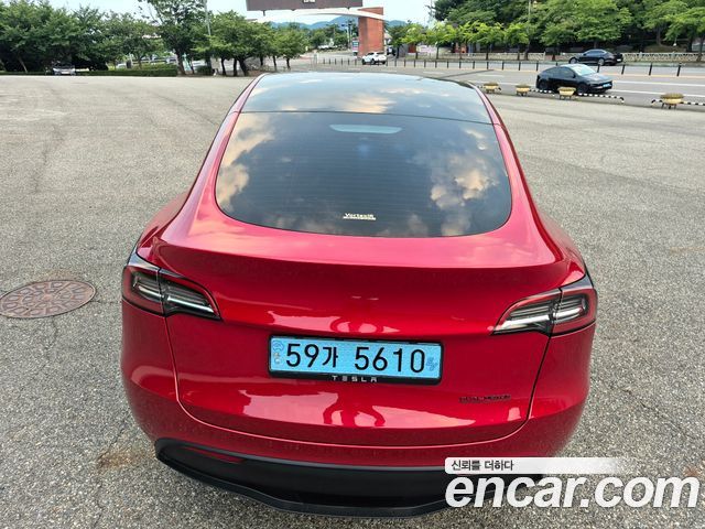 Tesla Model Y Long Range AWD - фото 2