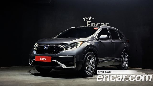 Honda CR-V 5-го поколения 2.0 Hybrid Touring 4WD - фото 0