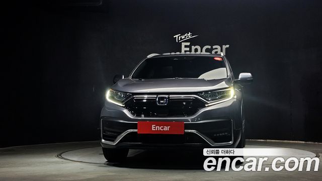 Honda CR-V 5-го поколения 2.0 Hybrid Touring 4WD - фото 2
