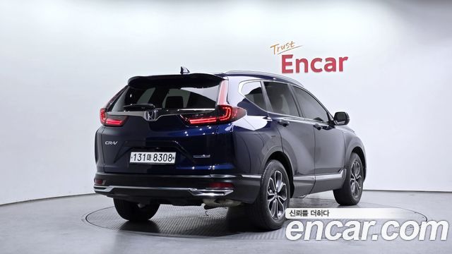 Honda CR-V 5-го поколения 2.0 Hybrid EX-L 4WD - фото 1