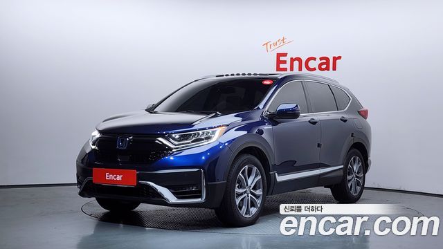 Honda CR-V 5-го поколения 2.0 Hybrid Touring 4WD - фото 0