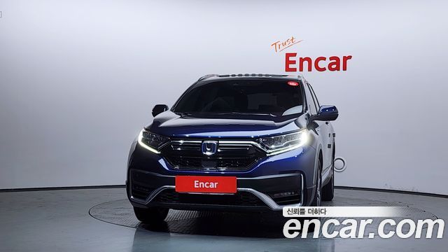 Honda CR-V 5-го поколения 2.0 Hybrid Touring 4WD - фото 2