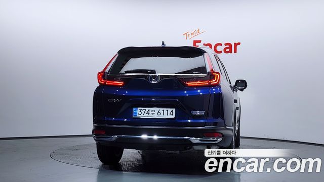 Honda CR-V 5-го поколения 2.0 Hybrid Touring 4WD - фото 3