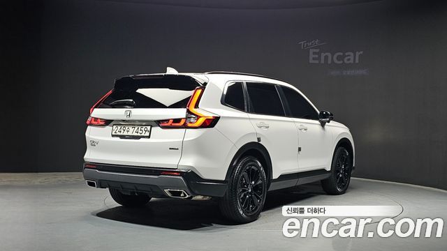Honda CR-V 6-го поколения 2.0 Hybrid Touring 4WD - фото 1