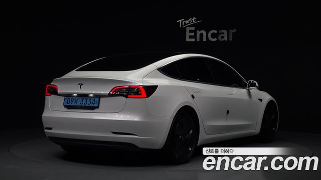 Tesla Model 3 Standard Range Plue RWD - фото 1
