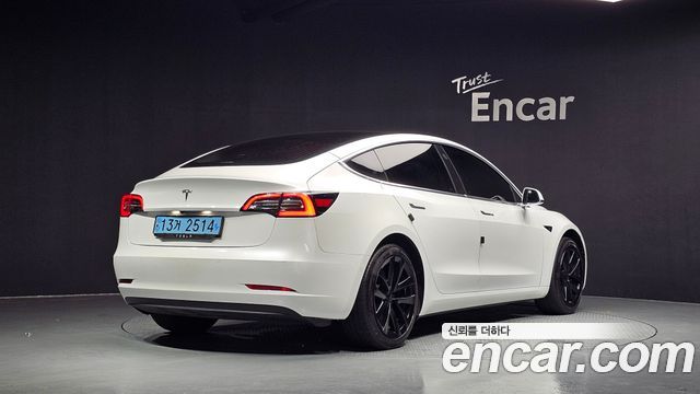 Tesla Model 3 Standard Range Plue RWD - фото 1