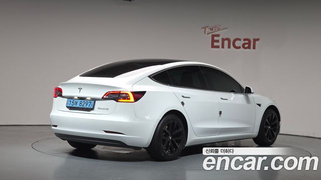 Tesla Model 3 Standard Range Plue RWD - фото 1
