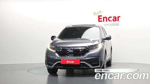 Honda CR-V 5-го поколения 2.0 Hybrid Touring 4WD - фото 1