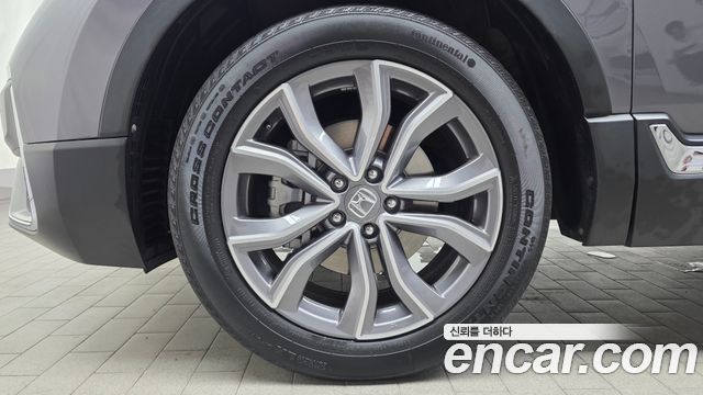 Honda CR-V 5-го поколения 2.0 Hybrid Touring 4WD - фото 3