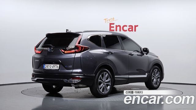 Honda CR-V 5-го поколения 2.0 Hybrid Touring 4WD - фото 0