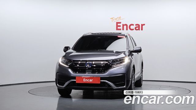 Honda CR-V 5-го поколения 2.0 Hybrid Touring 4WD - фото 1