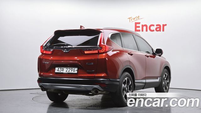 Honda CR-V 5-го поколения 1.5 Touring 4WD - фото 0
