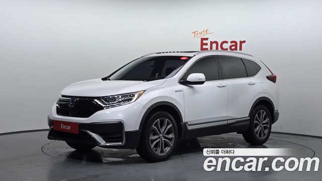Honda CR-V 5-го поколения 2.0 Hybrid Touring 4WD - фото 0