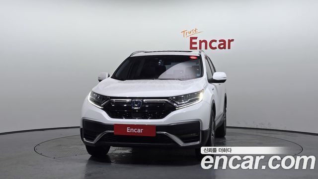 Honda CR-V 5-го поколения 2.0 Hybrid Touring 4WD - фото 2