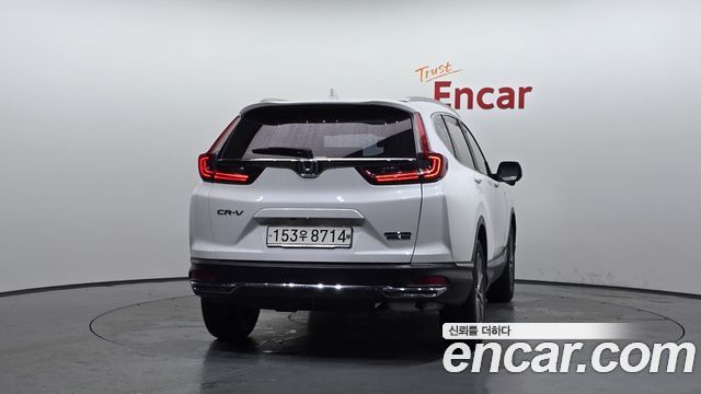 Honda CR-V 5-го поколения 2.0 Hybrid Touring 4WD - фото 3