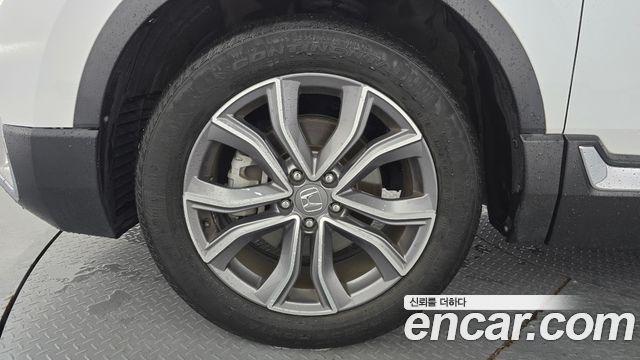 Honda CR-V 5-го поколения 2.0 Hybrid Touring 4WD - фото 4