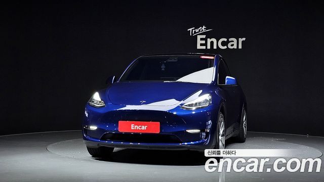 Tesla Model Y Standard Range RWD - фото 1