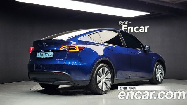 Tesla Model Y Long Range AWD - фото 1