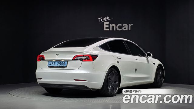 Tesla Model 3 Standard Range Plue RWD - фото 1
