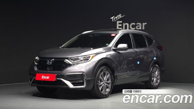 Honda CR-V 5-го поколения 2.0 Hybrid Touring 4WD - фото 0