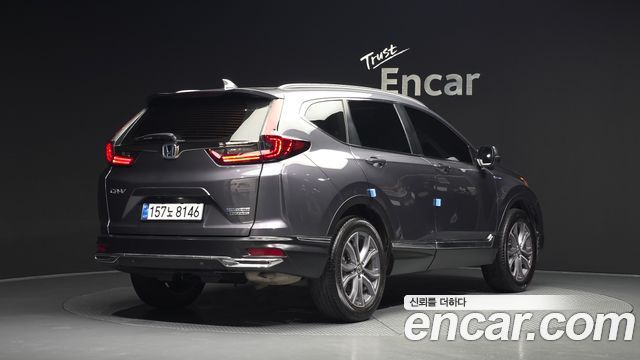Honda CR-V 5-го поколения 2.0 Hybrid Touring 4WD - фото 1