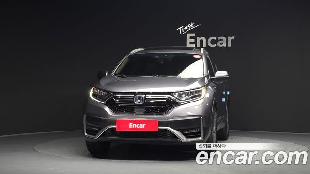 Honda CR-V 5-го поколения 2.0 Hybrid Touring 4WD - фото 2