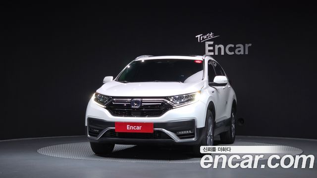 Honda CR-V 5-го поколения 2.0 Hybrid Touring 4WD - фото 2