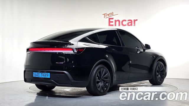 Tesla Model Y Long Range AWD - фото 1