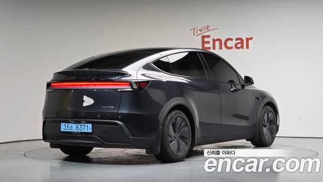 Tesla Model Y Premium Long Range AWD - фото 1