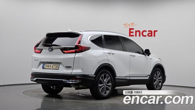 Honda CR-V 5-го поколения 2.0 Hybrid Touring 4WD - фото 0