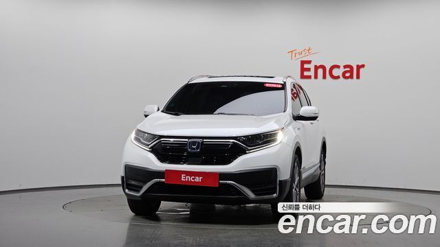 Honda CR-V 5-го поколения 2.0 Hybrid Touring 4WD - фото 1