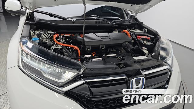 Honda CR-V 5-го поколения 2.0 Hybrid Touring 4WD - фото 4